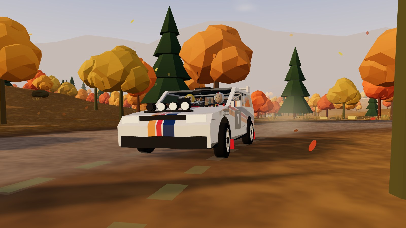 A rally car on an autumn road.