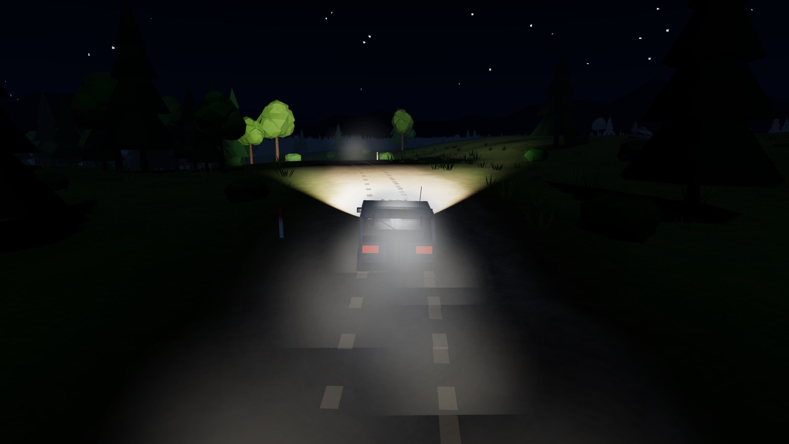 A rally car on a forest road at night with its lights on.